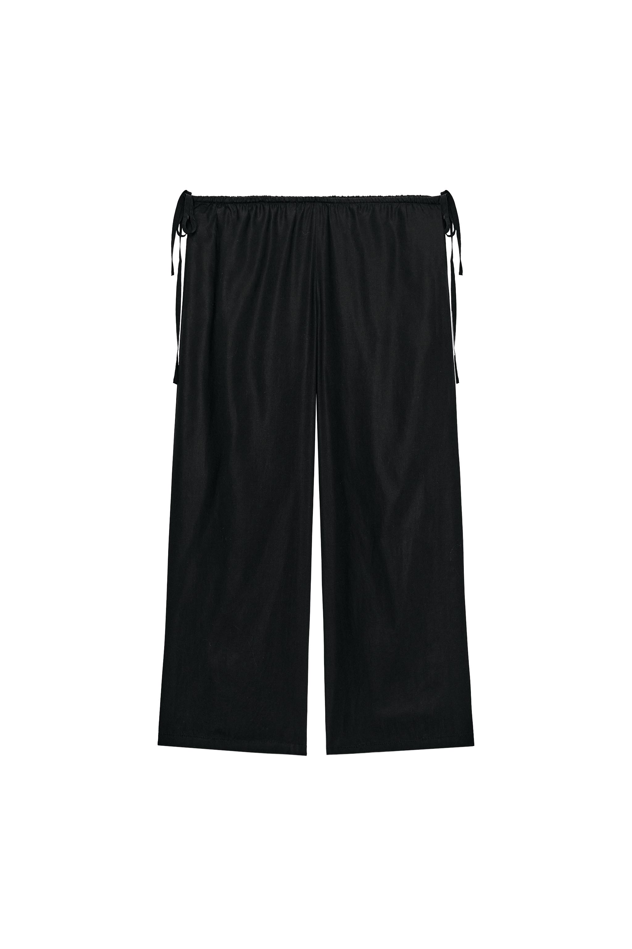 TIED ANKLE-LENGTH FLOWY PANTS